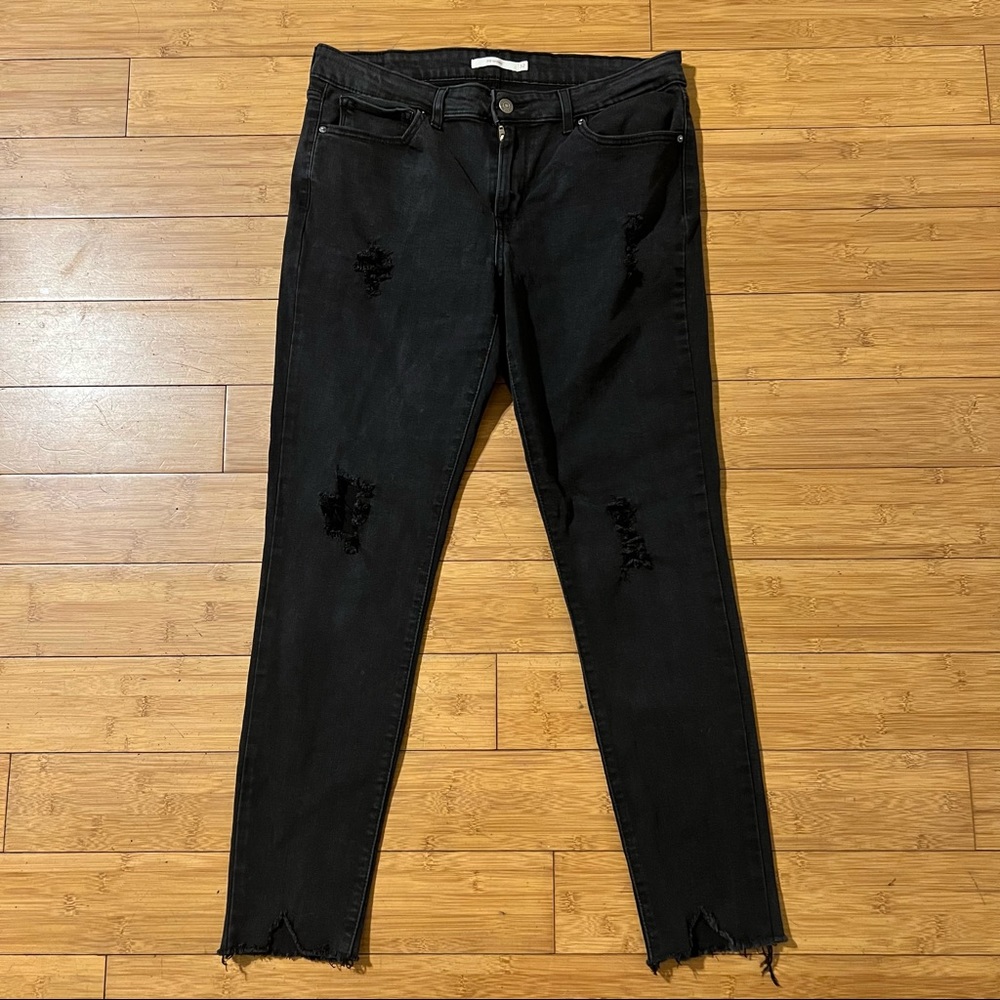Levi’s distress raw hem black jeans 711 skinny